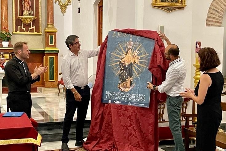 La Hermandad de los Patronos de Adra presenta su cartel religioso anunciador de la Feria y Fiestas de la localidad